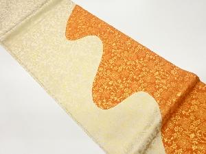 切り嵌め曲線に花唐草模様織出し袋帯